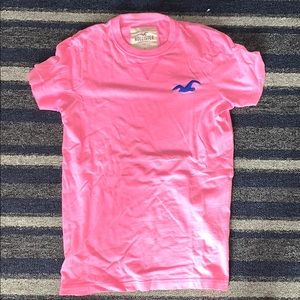 Pink Hollister shirt.